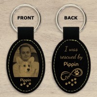 Rescued by My Dog Photo Personalised Leatherette Keyring - Oval Black Engraved Gold